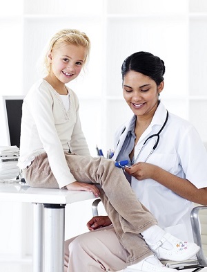 Doctor with patient at medical centre
